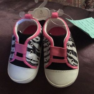 Sequins and hot pink baby girl tennis shoes.